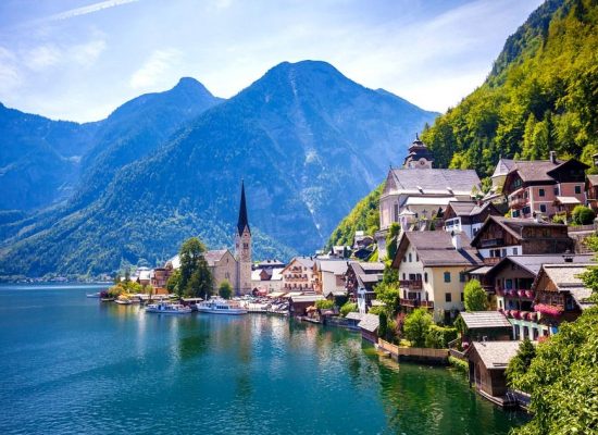 View of Hallstatt village with lake and Alps behind, Austria